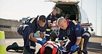 Paramedic, emergency and ambulance on road from car crash accident with healthcare, men and first aid. Patient, injury and medical help with rescue service with stretcher for transport to clinic 