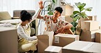 Happy, couple and people high five in new home, property investment and achievement together or moving support. Boxes, celebrating gesture and living room apartment, mortgage and success in house