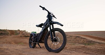 Buy stock photo Sports, electric bike and motorbike on sand outdoor for transport, auto machine and eco friendly of clean energy. Vehicle, safety and enduro riding, suspension and dirt race for sustainability power