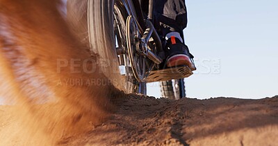 Buy stock photo Sand, dust and motorbike wheel for sports with power speed of training, performance technique and fitness. Athlete, riding and electric bike or travel adventure, dirt competition and race rally 