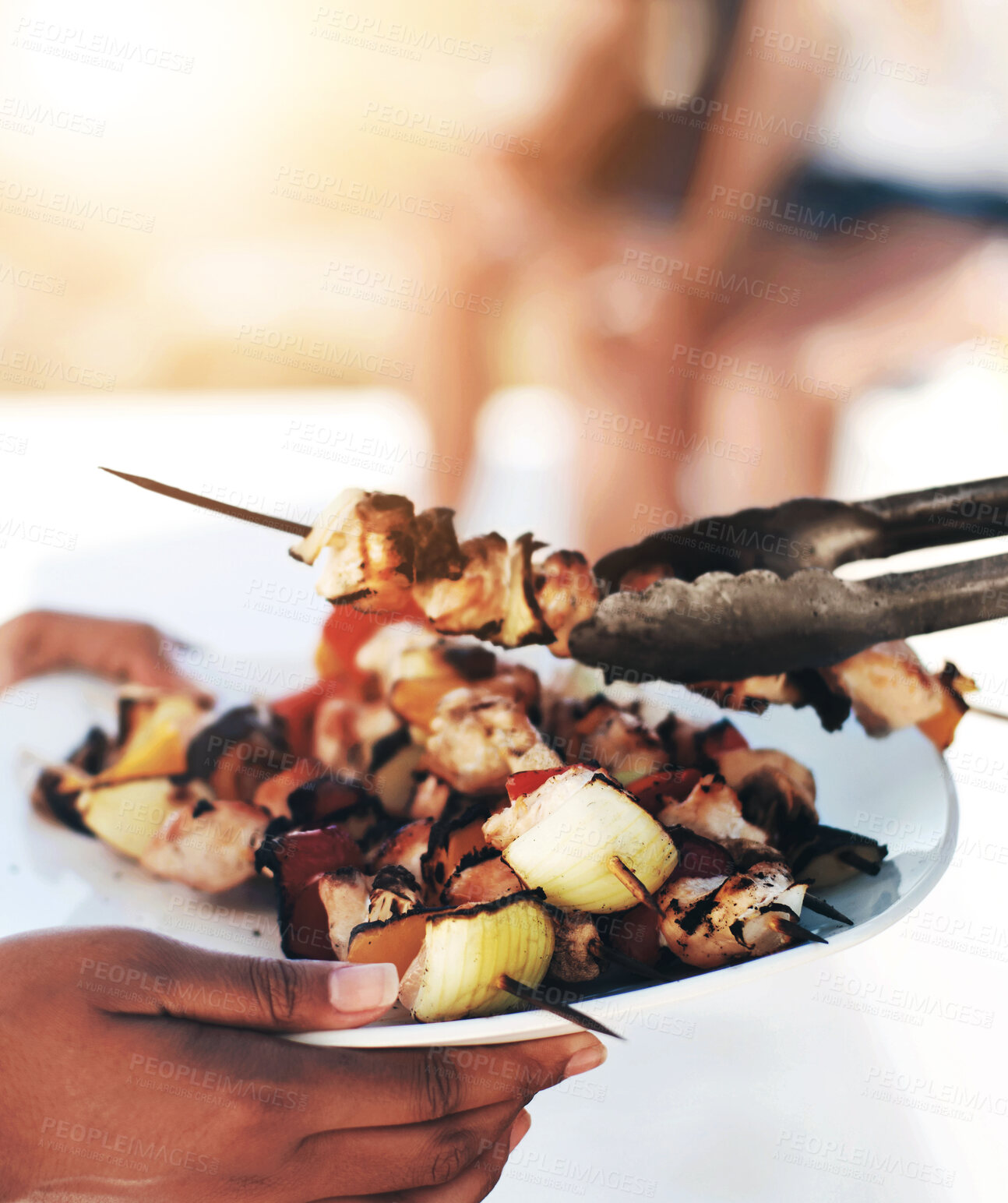 Buy stock photo Closeup of a plate of chicken kebabs straight from the barbeque
