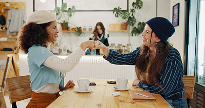 Buy stock photo Girl, friends and happy fist bump in cafe for social meeting, connection and bonding at lunch date. Smile, brunch and women in coffee shop together for morning drinks, greeting and reunion at table