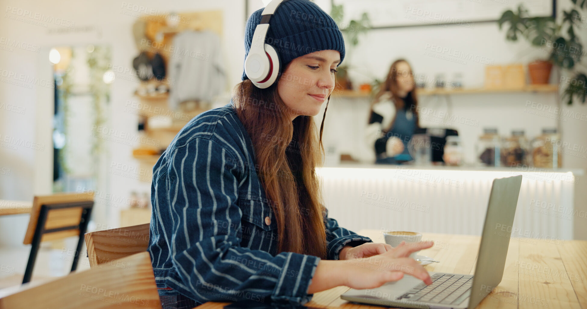 Buy stock photo Coffee shop, laptop and woman with headphones for remote work, typing email and networking. University, restaurant and person working on computer in cafe for online learning, research and education