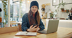 Woman, phone and laptop in coffee shop for remote work with notification, check and reading with freelance job. Person, smartphone and thinking with contact, networking and mobile app in cafeteria