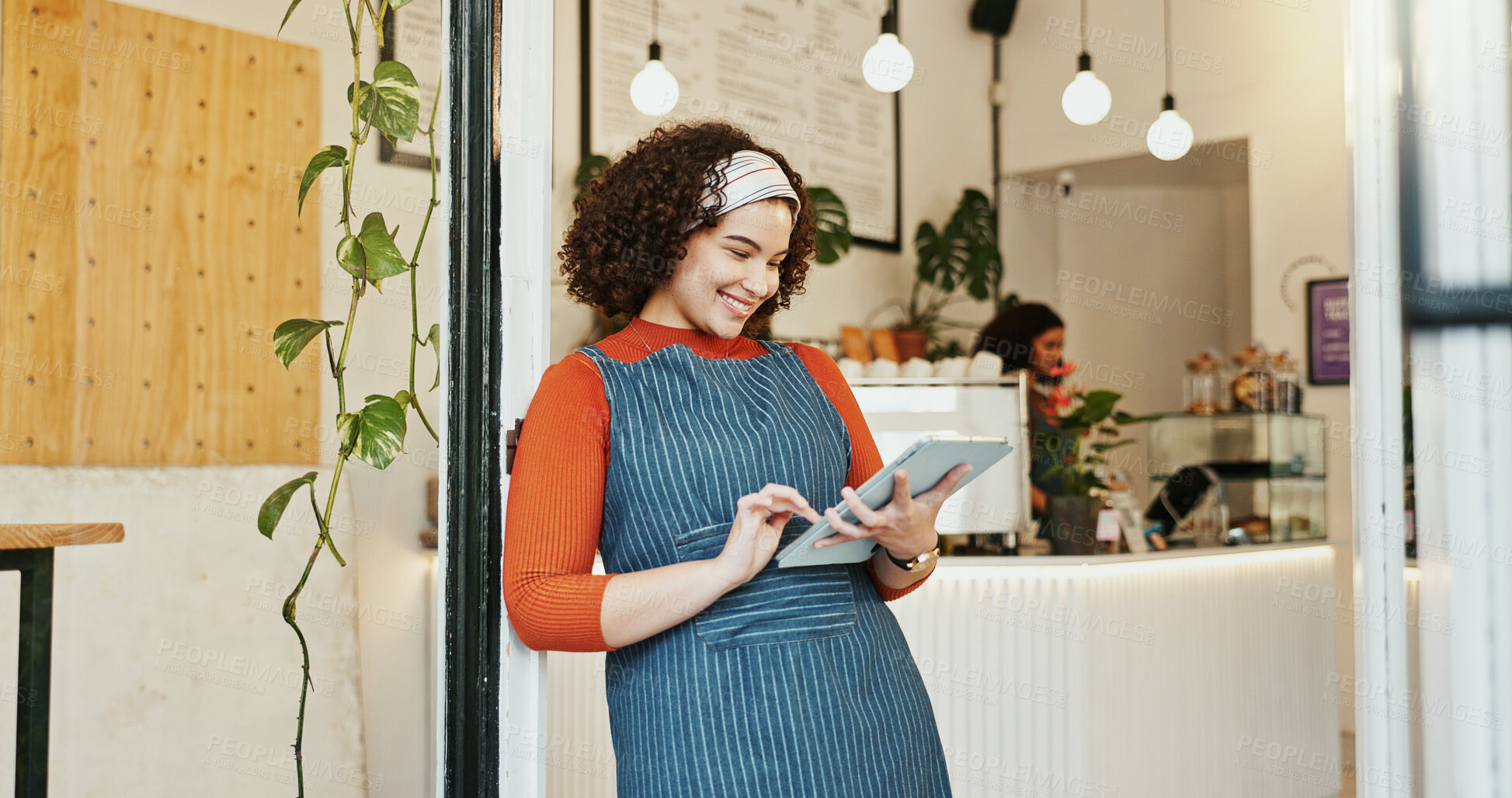 Buy stock photo Small business, woman searching and tablet in cafe, happy employee and online inventory or website order. Hospitality, coffee shop and doorway for idea for customer service, waitress and restaurant