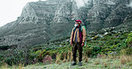 Thinking, mountain or senior black man in nature adventure or hiking journey in woods or outdoor travel. View, forest and person on trail walking for holiday, break or trekking to explore in France