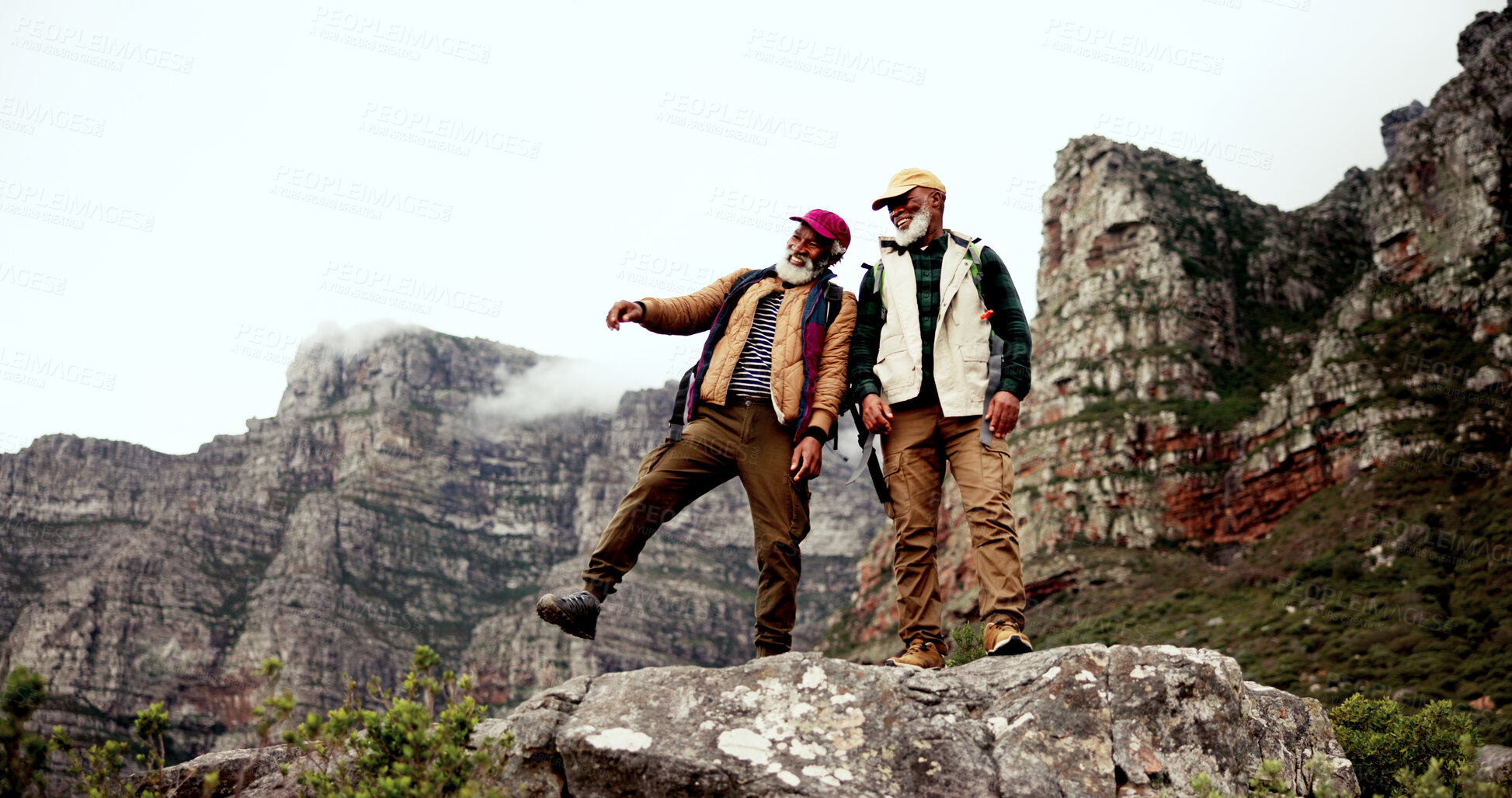 Buy stock photo Hiking, cliff and mature men on mountain with backpack for adventure, trekking and fitness. Travel, nature and happy people outdoors for wellness, journey or exercise on holiday, walking or vacation