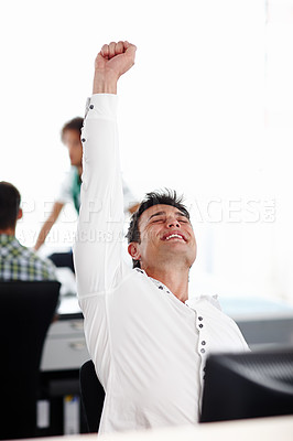 Buy stock photo Happy man, celebration and winning with relief for promotion, victory or raise at office. Excited, male person or young employee with smile for good news, prize or deal of online offer at workplace