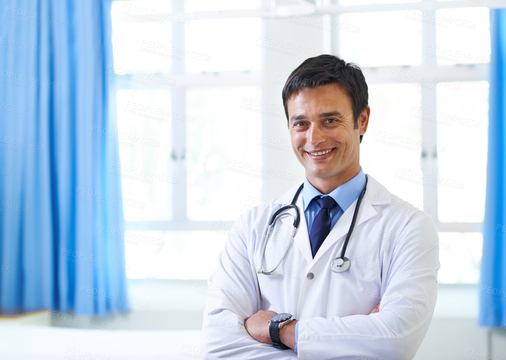 Buy stock photo Portrait, doctor and employee with smile, arms crossed and happy for first day in hospital, proud and expert. Clinic, medical professional and confidence of person, healthcare and lab coat for man