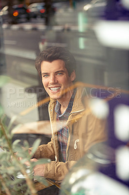 Buy stock photo Remote work, portrait and smile with creative man in coffee shop window for freelance job, report and email. Cafe, freelancer and technology with writer for copywriting, online article and website