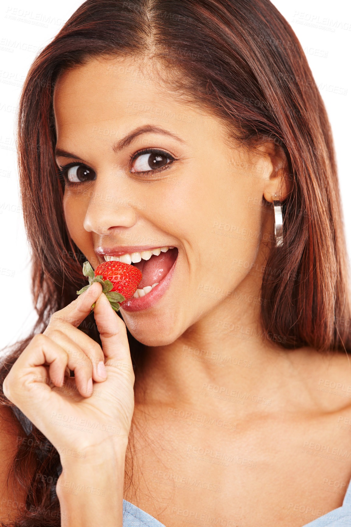 Buy stock photo Studio, portrait and woman with bite for strawberry, nutrition and health benefits with vitamin c. Female person, organic fruit and eating by white background for wellness, snack and smile for diet