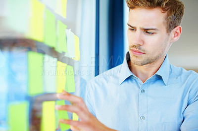 Buy stock photo Man, office and sticky notes for brainstorming idea, glass wall and problem solving for agenda. Male person, moodboard and schedule information for business proposal, employee and vision development