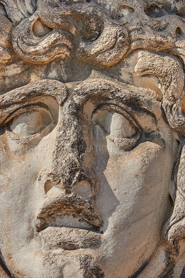 Buy stock photo Apollo, face closeup and sculpture for history, trip or Turkey culture tourism travel with Didyma temple ruin. Statue, destination and stone with sorrow, architecture and Bodrum summer adventure