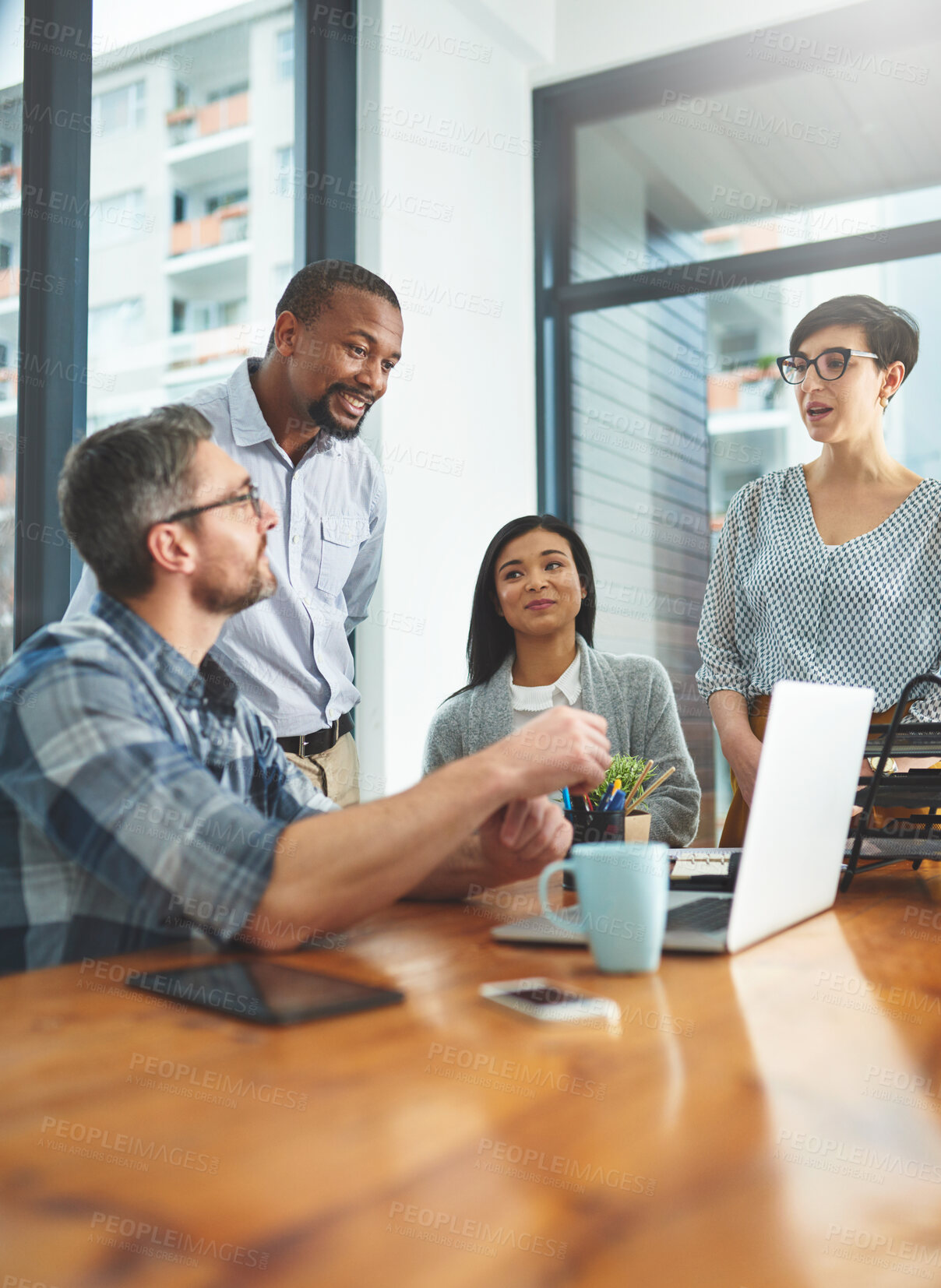 Buy stock photo Shot of businesspeople working together in the office 