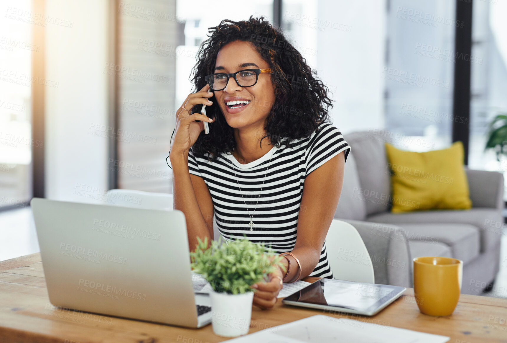 Buy stock photo Shot of a young woman working from home