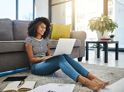 Buy stock photo Shot of a young woman working from home