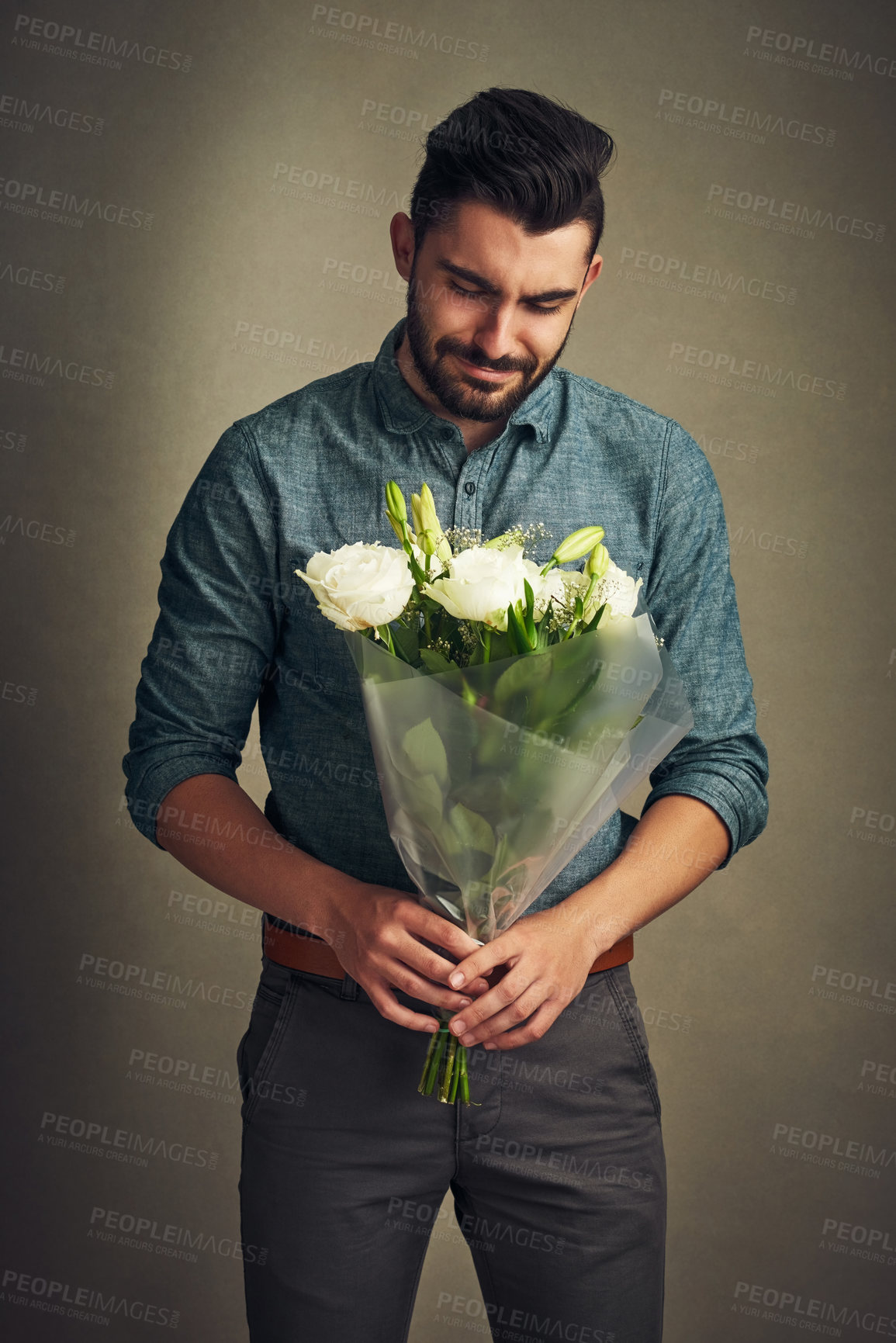 Buy stock photo Flowers, man or sad with bouquet gift for apology, sympathy or white roses for kindness. Person, unhappy and floral bunch for mistake, plant and support present for gratitude on studio background