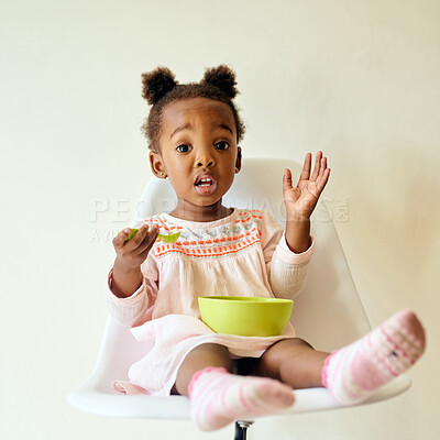 Buy stock photo Black girl, child portrait and breakfast in home, eating and bowl of nutrition by wall background. Female person, morning meal and healthy vitamins or fiber for wellness, kid and food for development