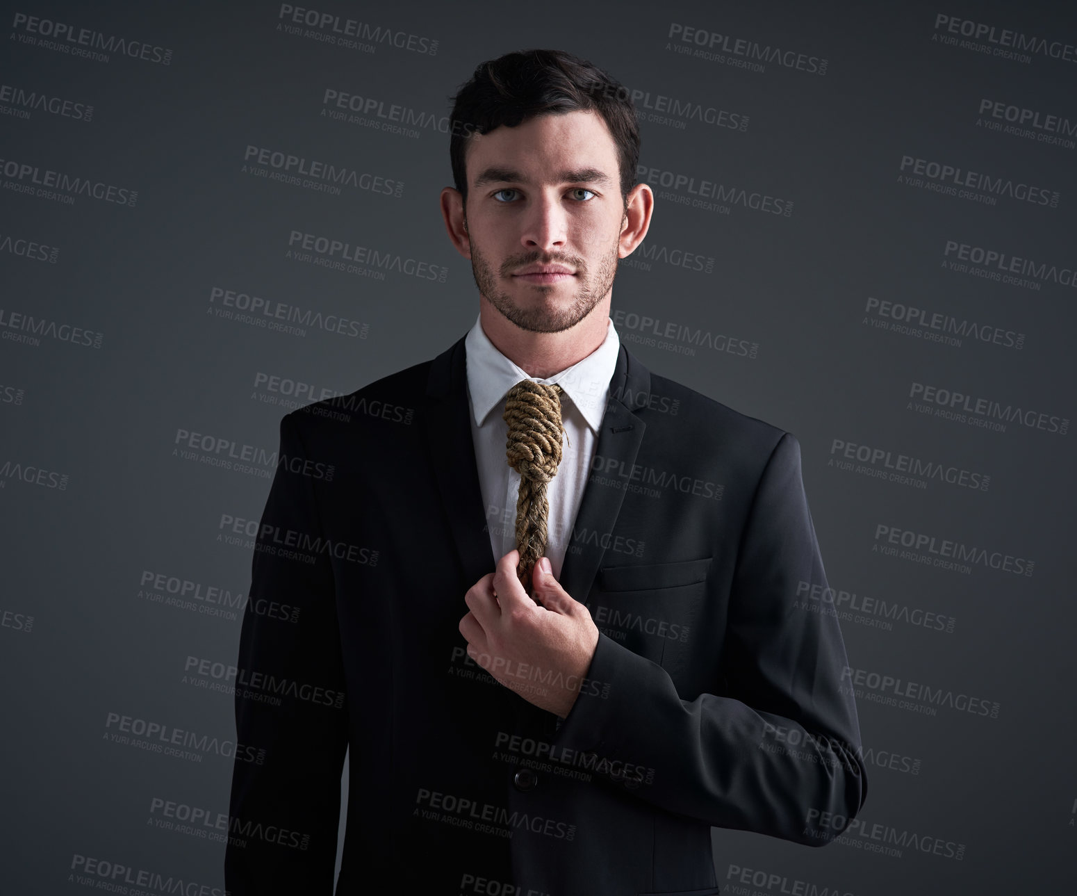 Buy stock photo Businessman, portrait and noose tie with corporate stress, finance debt and economy pressure. Model, metaphor and cost crisis with financial bondage, failure and execution on gray studio background