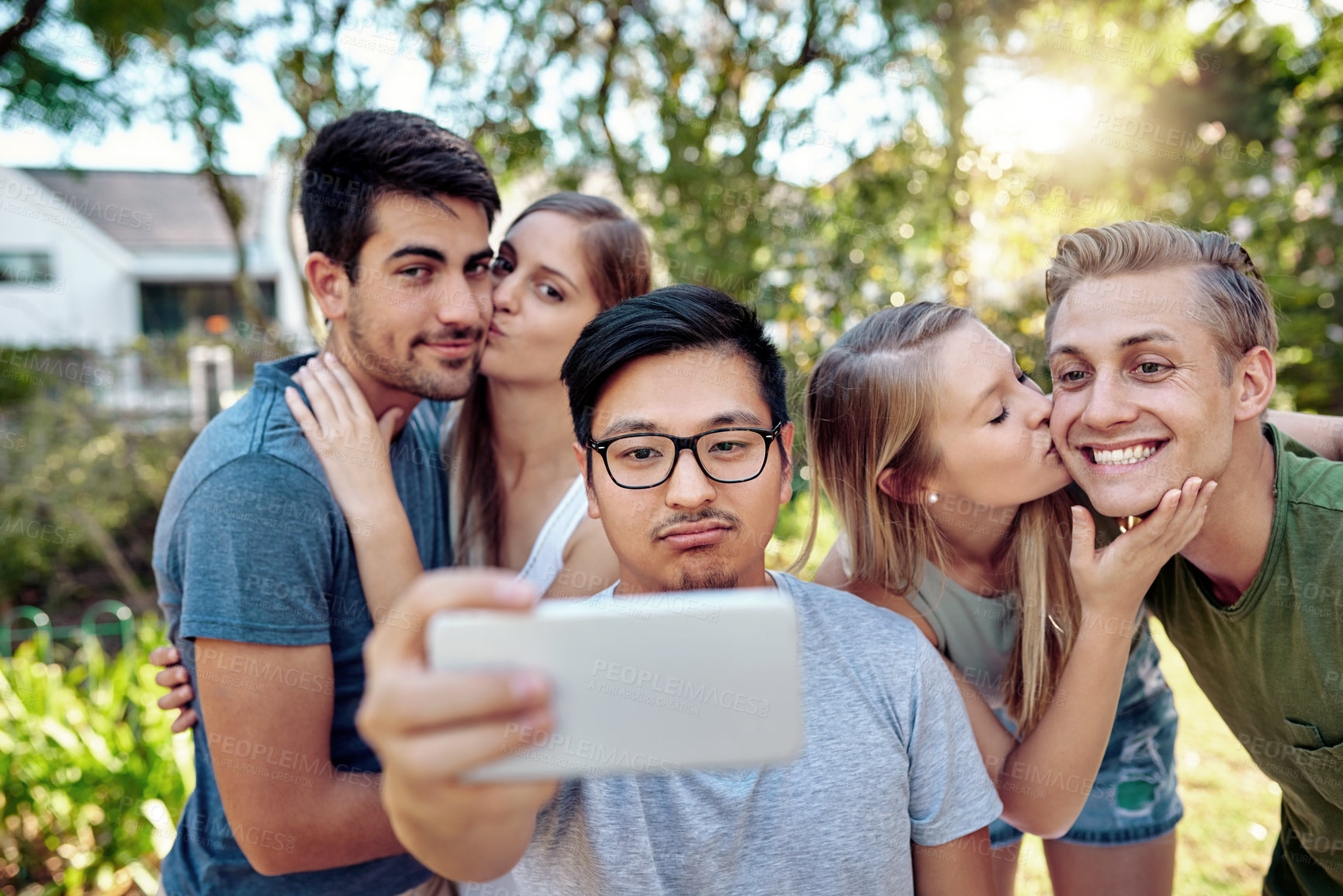 Buy stock photo Selfie, lonely and couple of friends outdoor in nature together for bonding, kissing or profile picture. Memory, sad or social media with single man and people in park for photograph of weekend