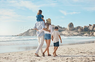 Buy stock photo Family, back and walking on beach for travel, holiday and adventure together as bonding on sand. Woman, dad and children by ocean for fun trip, vacation and holding hands with support and carrying