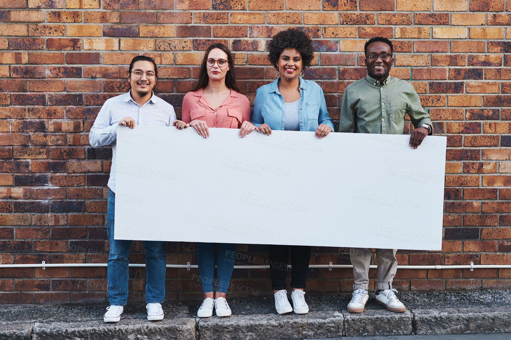 Buy stock photo Advertising, portrait and poster mockup of people outdoor on city street together with brick wall background. Business, diversity or space on banner for marketing with man and woman employee group