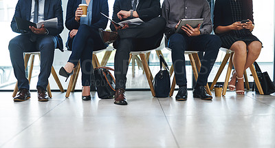 Buy stock photo Business people, legs and group in waiting room for interview, hiring opportunity and job search. Chairs, queue and feet of candidates in office for hr meeting, recruitment and onboarding process