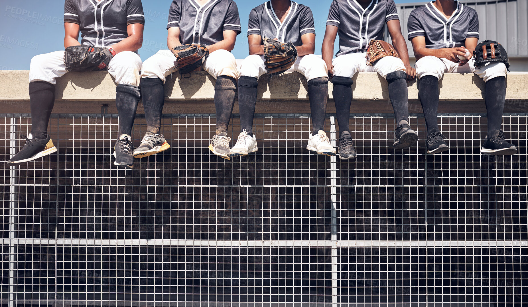 Buy stock photo Baseball team, legs and relax for watch on dugout, athlete and practice for match on field. Wait, rest and together in uniform for male people for softball, stadium and sport in summer for workout