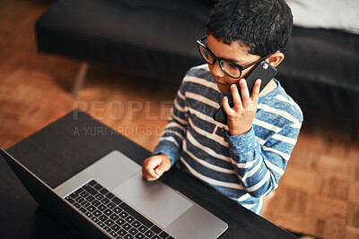 Buy stock photo Phone call, child and talking in home with laptop for story, game and learning on internet in living room. Mobile, contact and boy in conversation for communication, education and listening to play