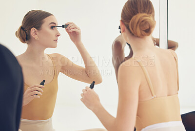 Buy stock photo Girl, ballerina and makeup by mirror for beauty, prepare or mascara for concert, training and backstage for show. Dancer, reflection and back with cosmetics, eye lashes or performance art at academy