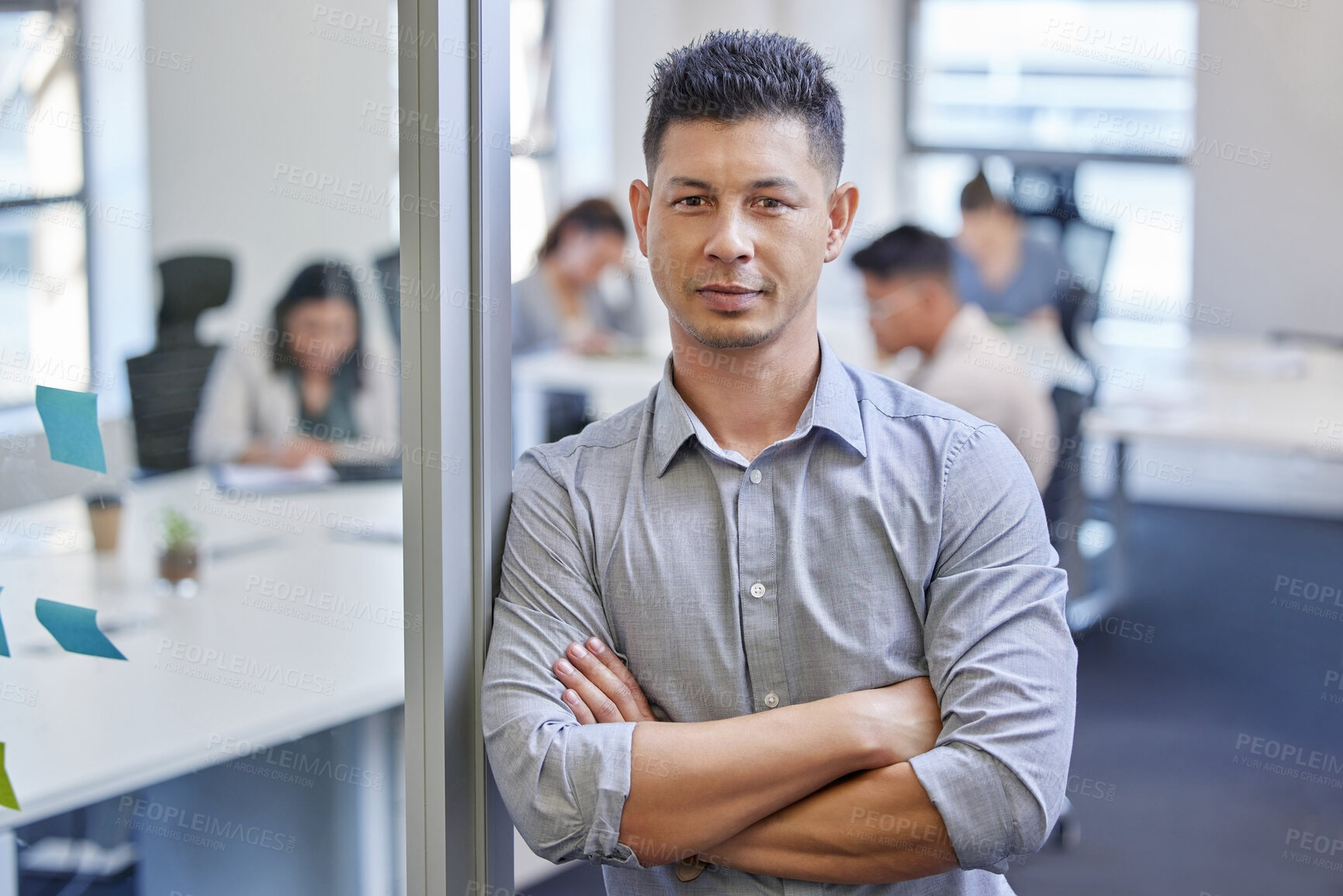 Buy stock photo Portrait, business man or employee with arms crossed in office for confidence and leadership. Teamwork, male person or project manager in boardroom with colleagues for planning and solidarity