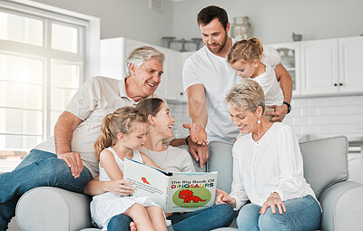 Buy stock photo Happy, big family and reading with book on sofa for kids story of dinosaurs together at home. Parents, grandparents and young children or siblings with novel on couch for quality time or bonding