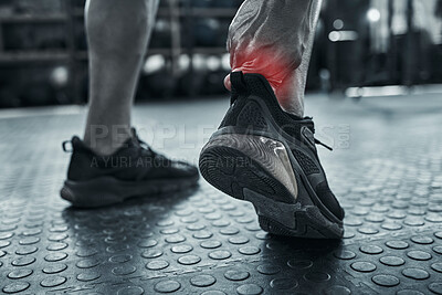 Buy stock photo Ankle pain, fitness and injury with athlete on floor of gym for accident, fail or mistake in black and white. Anatomy, back and emergency with red highlight on joint of hurt person in workout