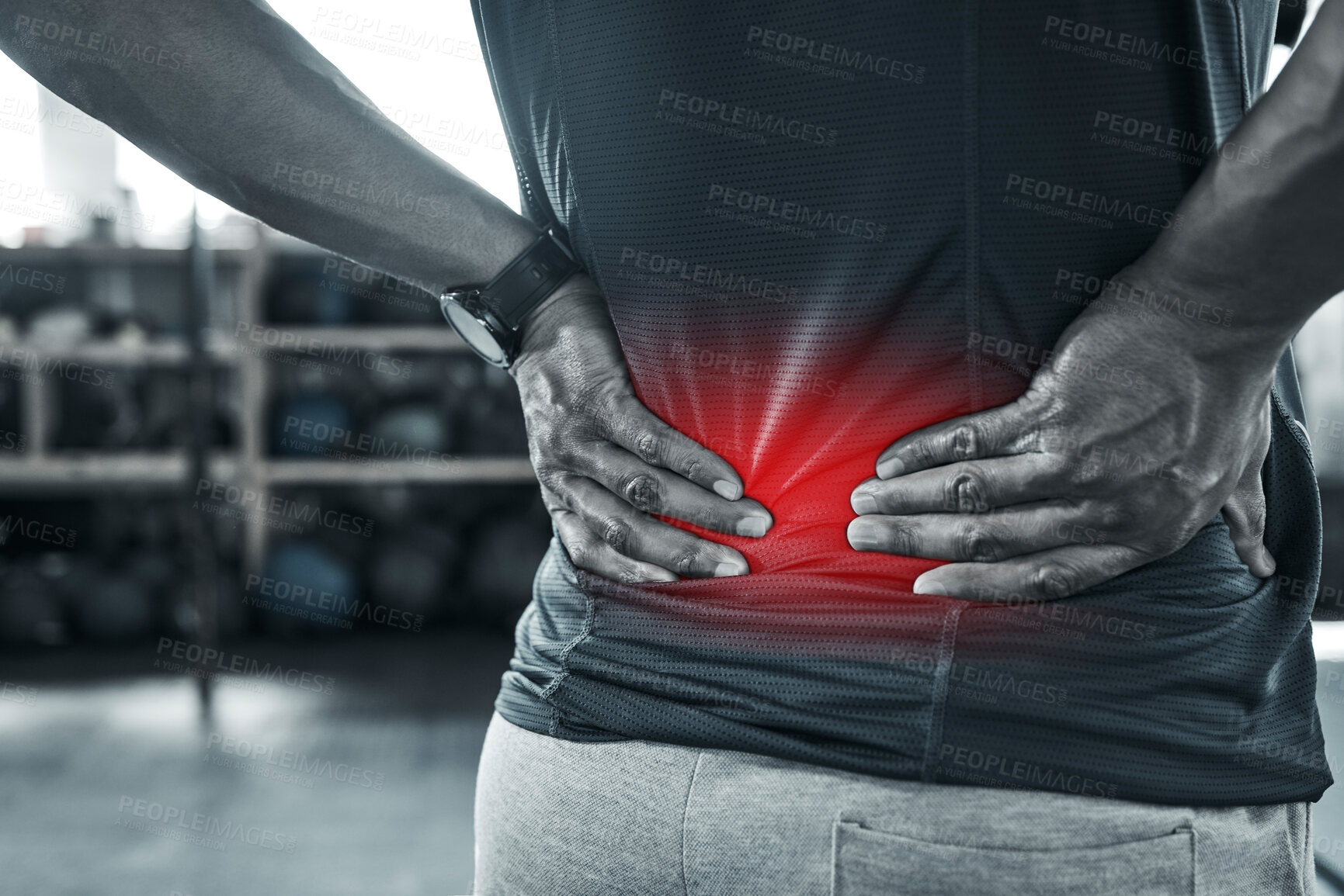 Buy stock photo Man, fitness and back pain with red glow at gym with muscle tension at sports center. Male person, workout and exercise with ache, injury and inflammation on training or warm up for wellbeing