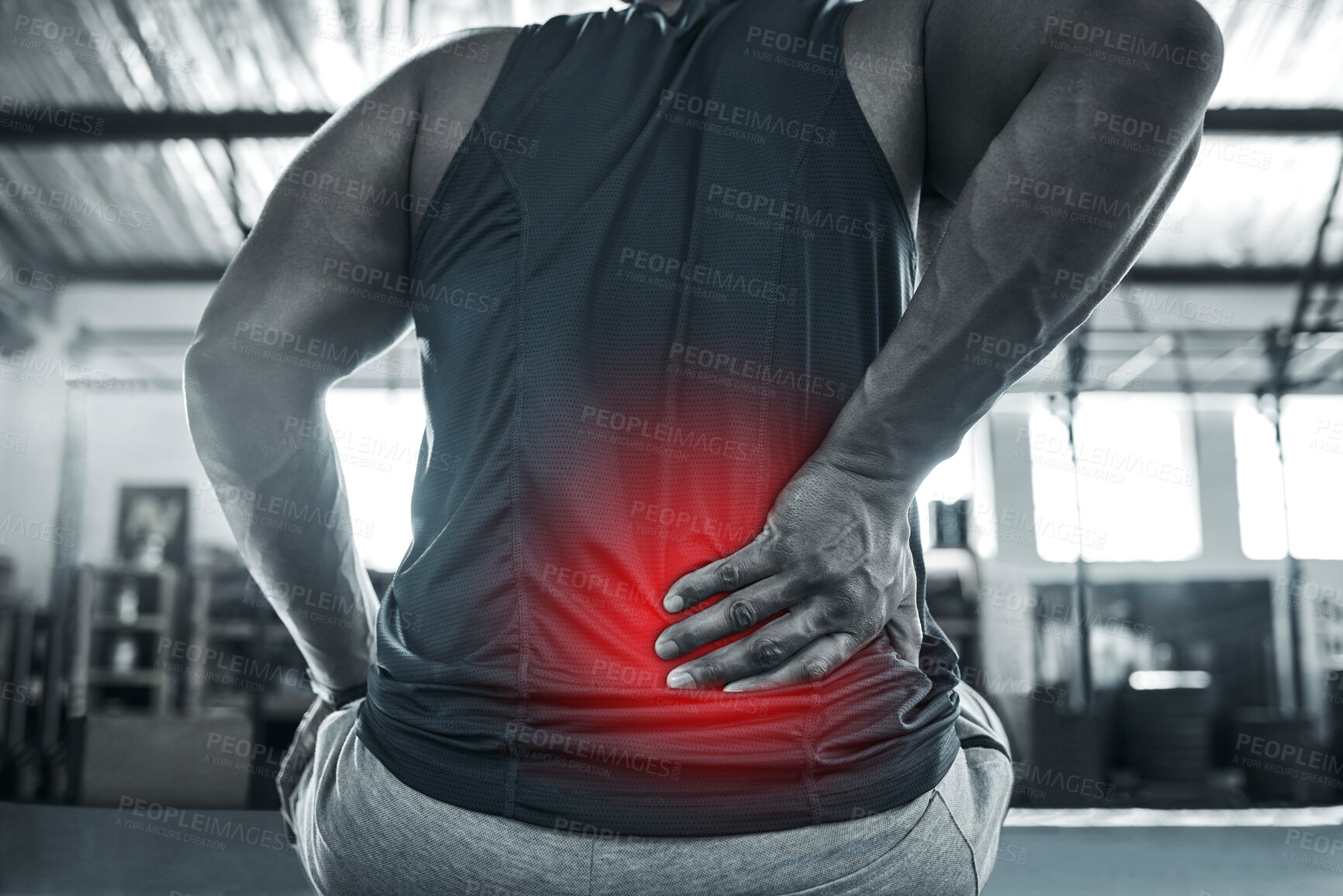 Buy stock photo Man, workout and red glow for back pain at gym with muscle tension and strain on weightlifting. Male person, fitness and exercise with ache, injury and inflammation on training and warm up for health