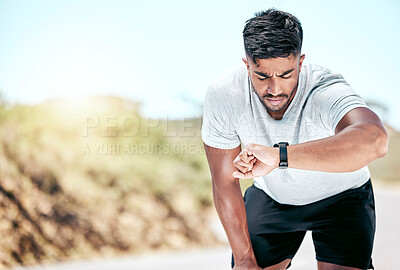 Buy stock photo Outdoor, man and fitness with digital watch to monitor or tracking health, wellness and wellbeing. Male person, water bottle and sweat in road with checking running results, heart rate on app