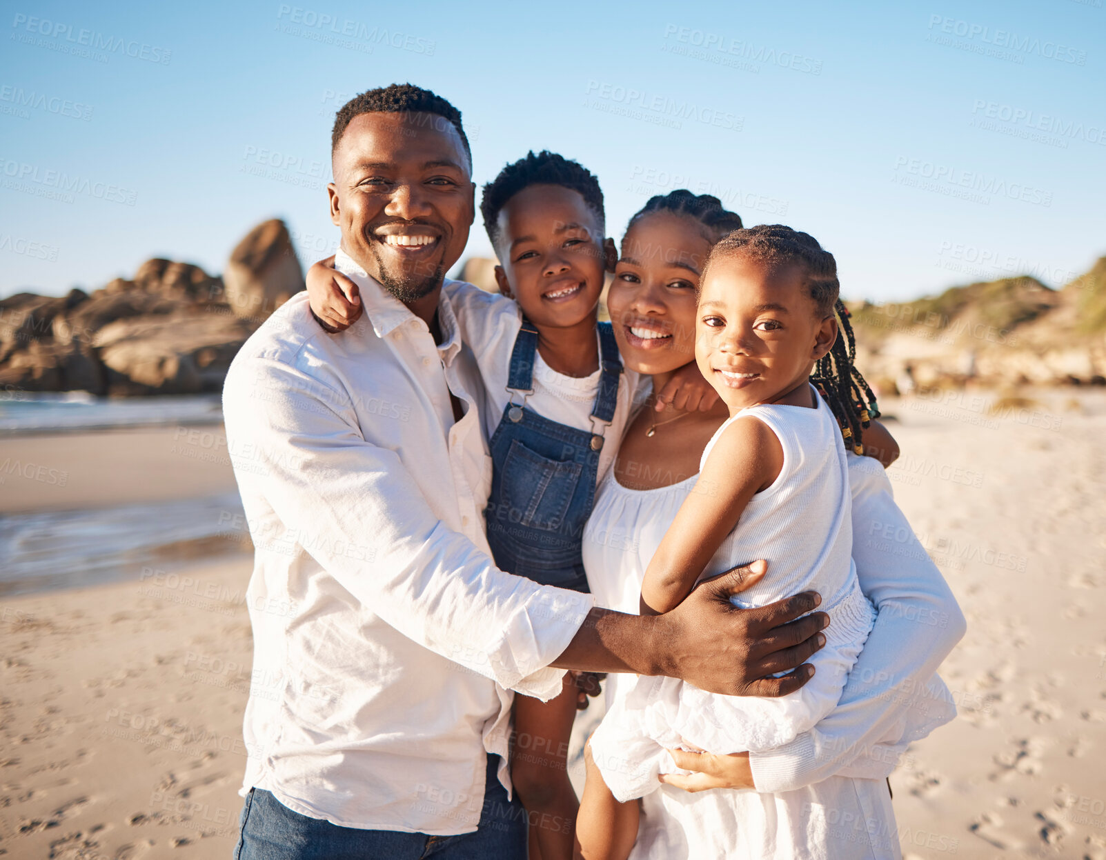 Buy stock photo Black family, portrait and smile with children at beach for weekend trip, adventure and holiday. Happy, mother and father with kids by ocean for summer vacation, love and outdoor travel in Mauritius