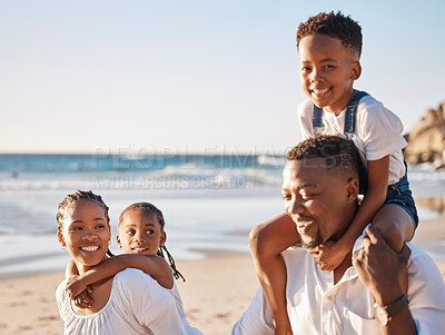 Buy stock photo Piggyback, smile and black family at beach for fun on tropical vacation, travel or getaway. Happy, bonding and portrait of African children with parents by ocean on holiday, adventure or weekend trip