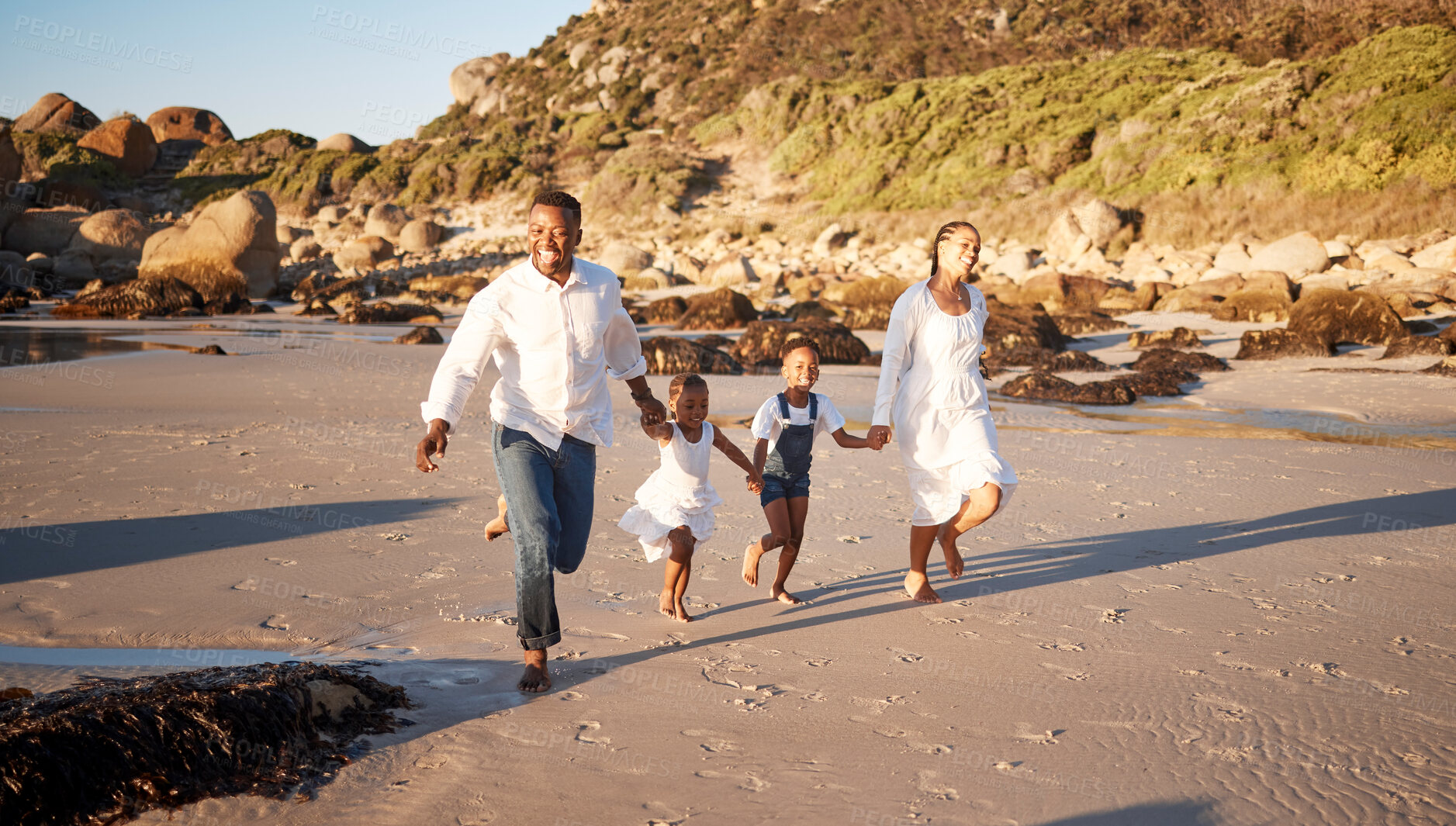 Buy stock photo Black family, holding hands and running on beach for travel with bonding, adventure or holiday fun with smile. African people, parents or children at ocean for playing, support or enjoyment in summer