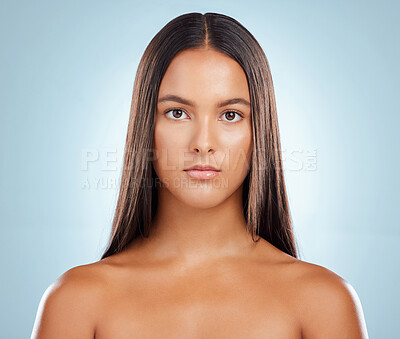 Buy stock photo Woman, straight and hair care in studio portrait, keratin treatment and smooth on blue background. Female person, growth and cosmetics shampoo or conditioner for healthy scalp, clean and brazilian