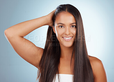 Buy stock photo Hair care, studio and happy portrait of woman with straight hairstyle, luxury salon treatment and smile. Keratin, soft touch and face of confident Brazilian model girl isolated on blue background