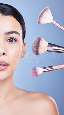 Buy stock photo Studio, portrait and woman face with brush for makeup, foundation and cosmetics for application. Female model, results and spa for transformation, beauty and creativity with tools by blue background