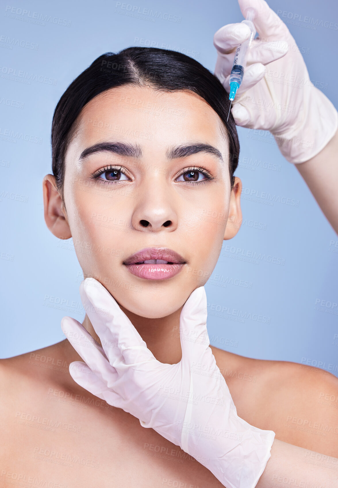Buy stock photo Woman, hands and confident for facelift with needle in studio on blue background for grooming and beauty. Female person, aesthetics and portrait with cosmetics for skincare, filler and anti aging
