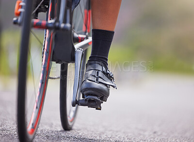 Buy stock photo Cycling, person and feet on bike in road for cardio workout, adventure and physical activity in nature. Cyclist, ride and pedal on bicycle for challenge with endurance, hobby and competition training