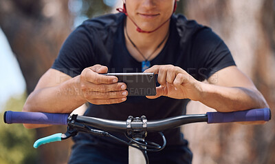 Buy stock photo Sports, bicycle and hands of person with phone for training, adventure and exercise in nature. Fitness, cycling and cyclist on mountain bike with smartphone for navigation, website and health app