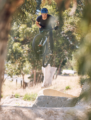 Buy stock photo Sports, trail and man jump on bicycle for training, competition and exercise in countryside. Fitness, cycling and person on mountain bike in air for adventure, freedom and adrenaline on dirt path