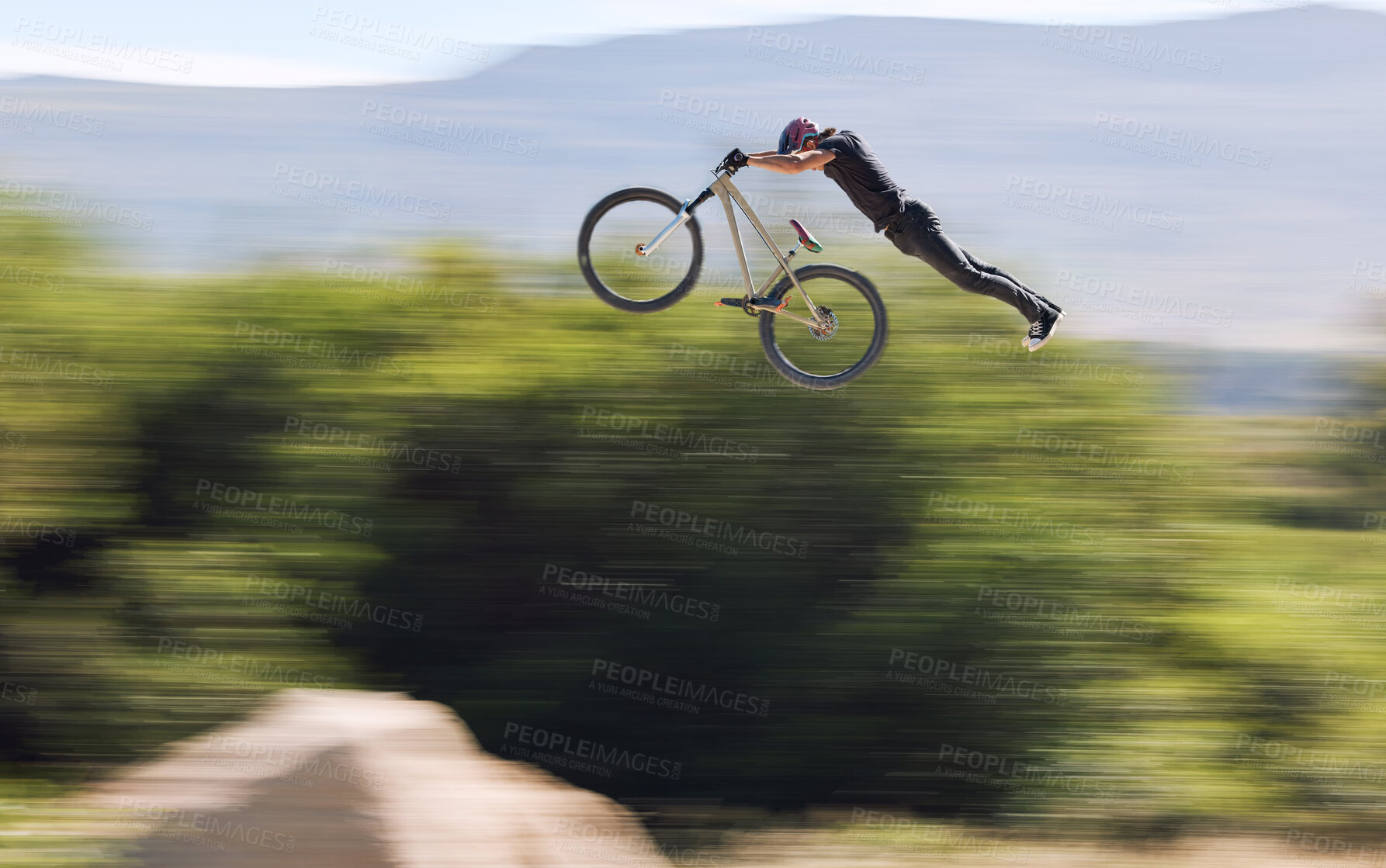 Buy stock photo Jump, cycling and person on trick bike with adventure, adrenaline and speed in stunt competition, Extreme sport, air and athlete on bicycle for challenge, talent or energy on action course in nature