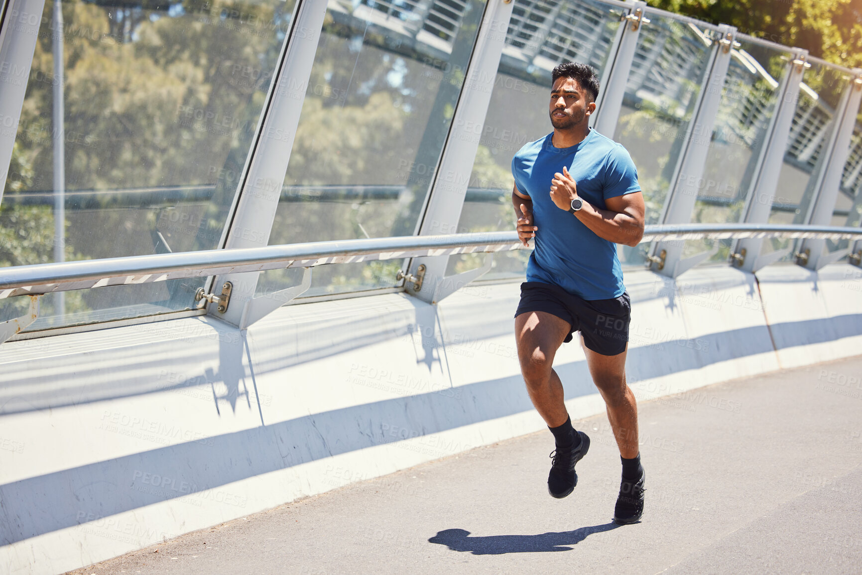 Buy stock photo Running, man and city road with workout, fitness and marathon training outdoor with cardio. Bridge, athlete and race on an urban street with exercise in the morning in New York with runner sprint 