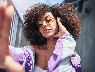 Buy stock photo Woman, fashion and selfie with social media in city with influencer, style and retro clothes outdoor. Afro, profile picture and confidence of African person with creativity and cool jacket with pose