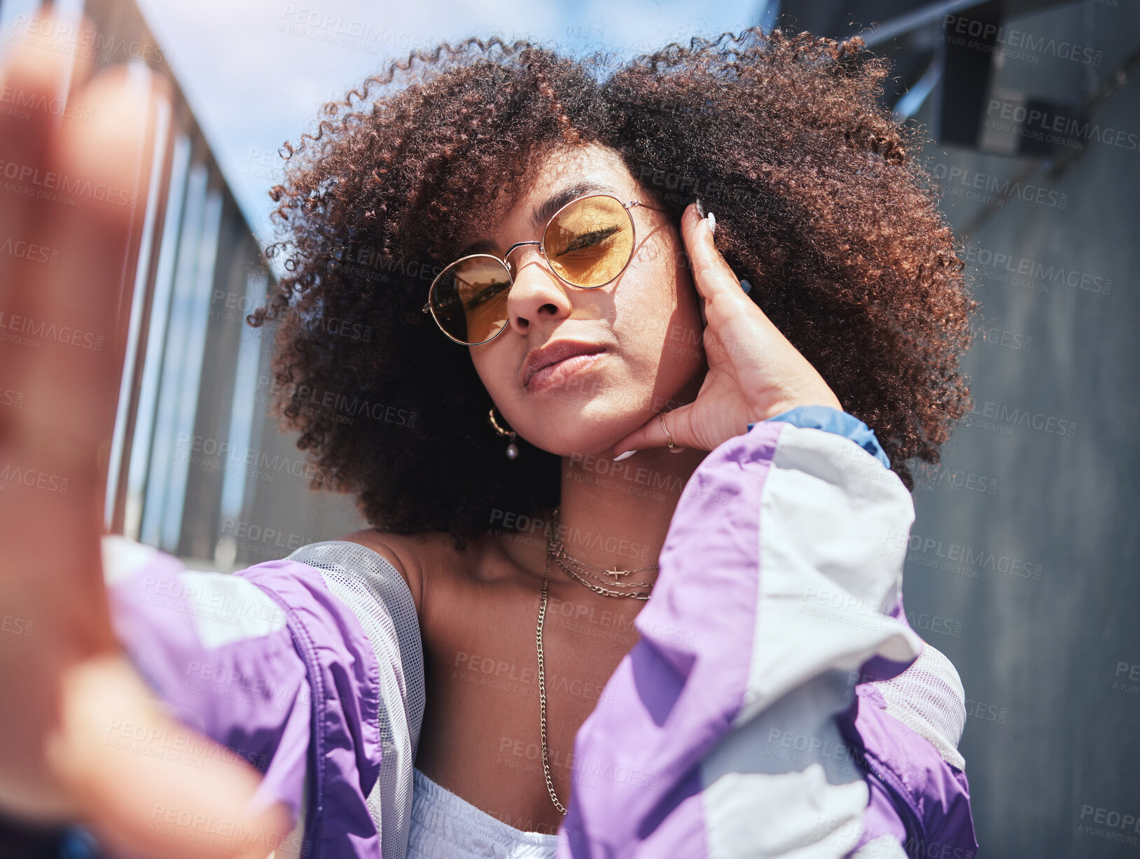 Buy stock photo Woman, fashion and selfie with social media in city with influencer, style and retro clothes outdoor. Afro, profile picture and confidence of African person with creativity and cool jacket with pose